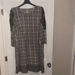 Black and white, casual dress. Can be dressed up down. A good look for church.